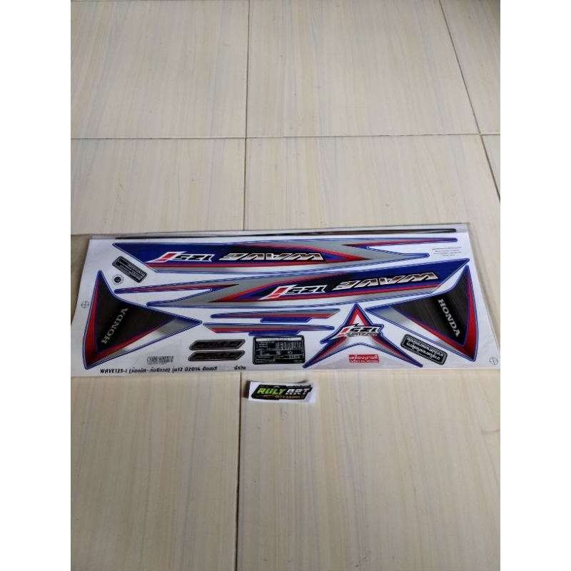 striping wave Supra x 125 helm in biru