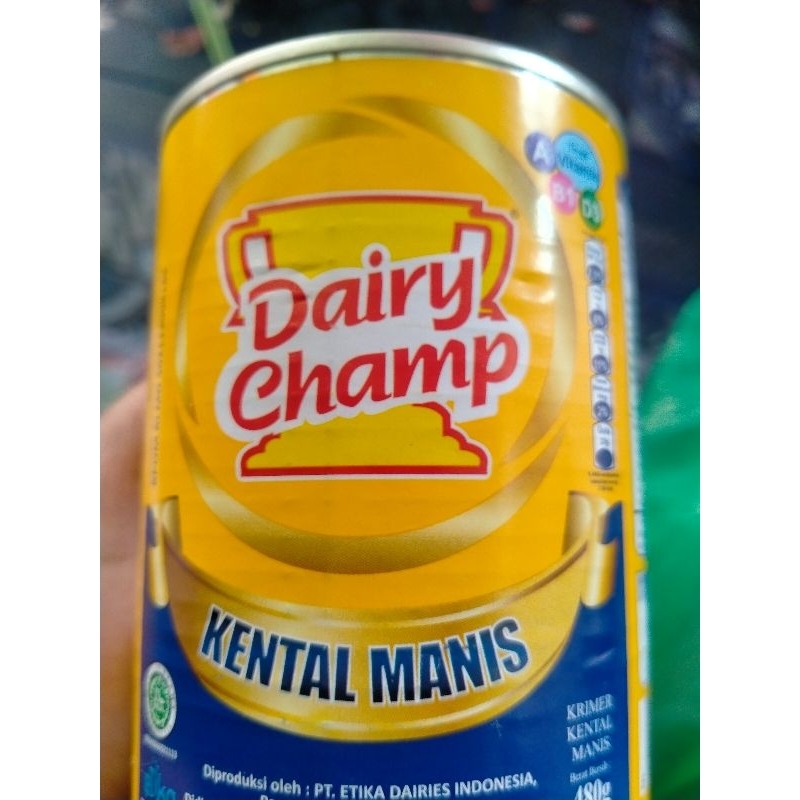 

susu kental manis putih Dairy champ