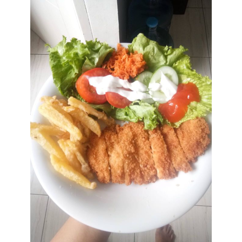 

chicken katsu with French fries and vegetables salad