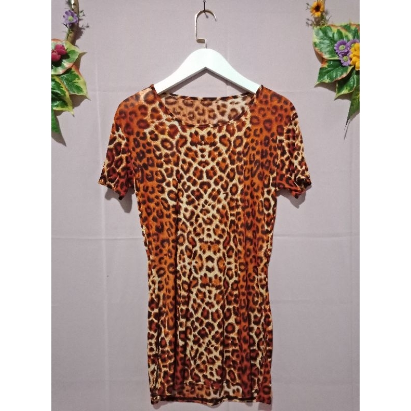 Prelove Atasan Kaos Tunik Leopard Ld 90 masih bisa melar