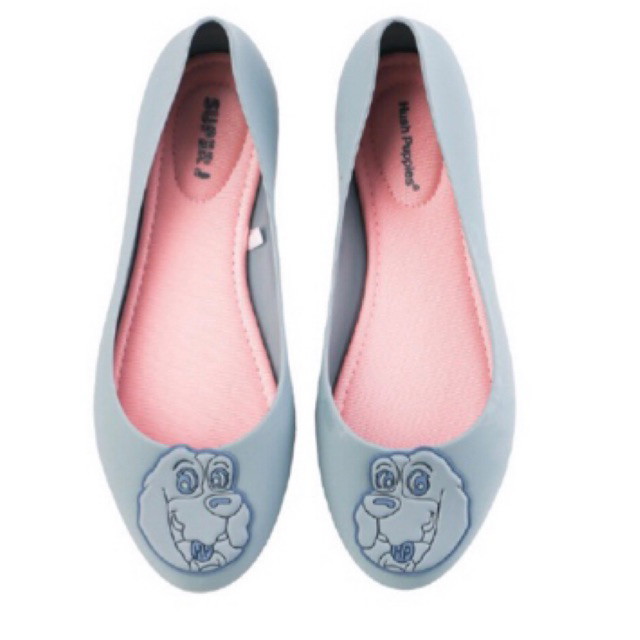 Flat shoes brand Hush Puppies