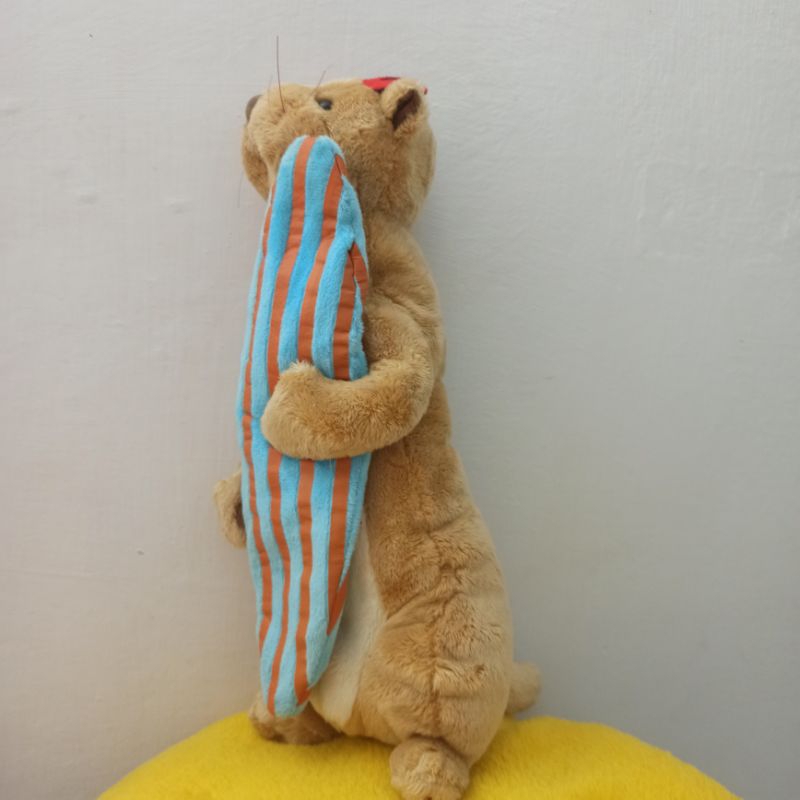 boneka hewan berang berang selancar plush doll mainan anak