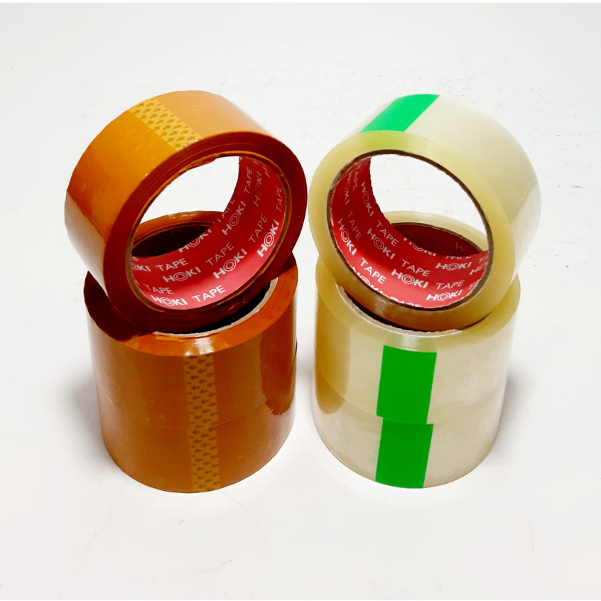 

Harga Grosir ( 1karton/72pcs ) Lakban Tape Hoki /Pluto Bening Dan Coklat 2inchX45mmX72yard
