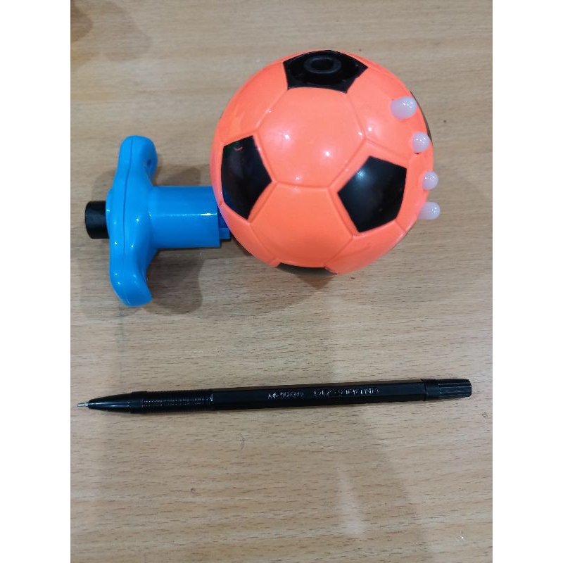 Mainan Gangsing lampu dan musik