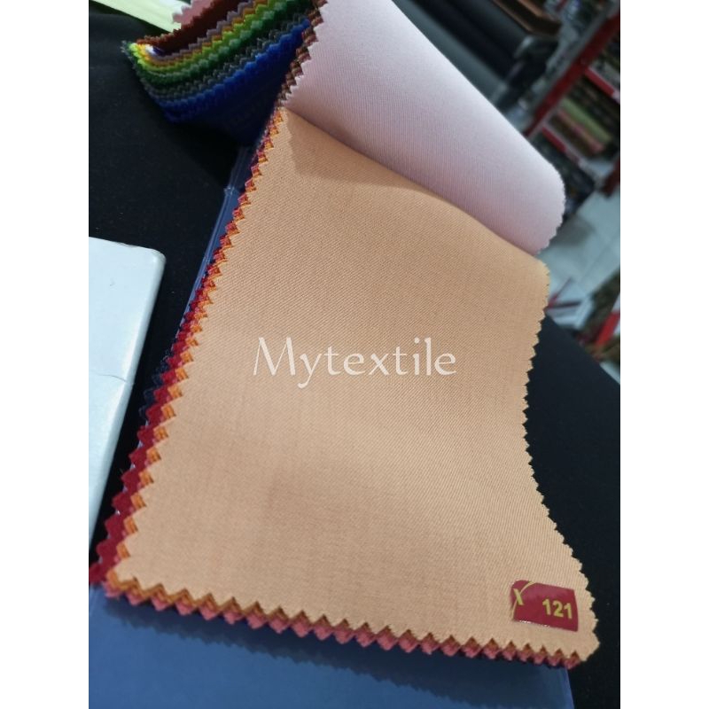 kain novus seragam dharmawanita