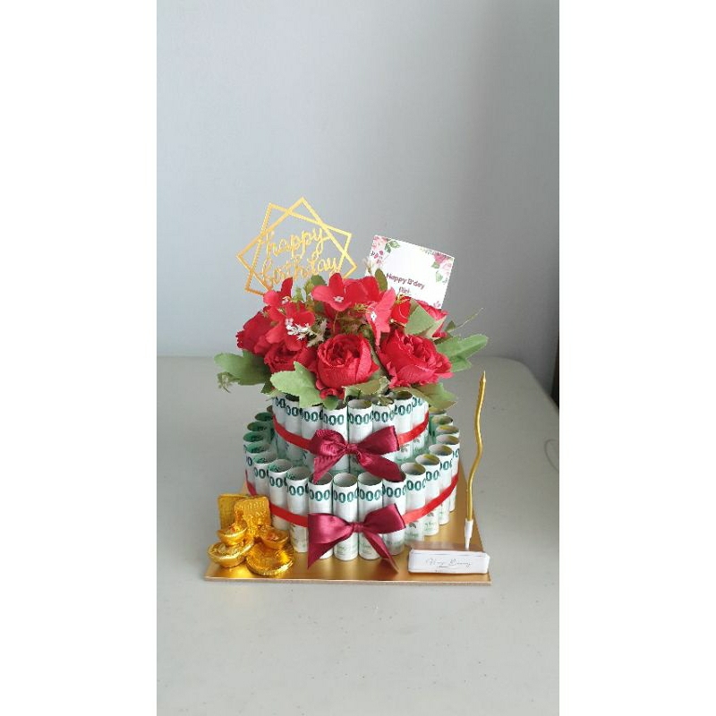 

cake uang nominal 1 jt