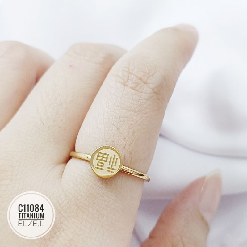 Cincin titanium lucky word gold C11084