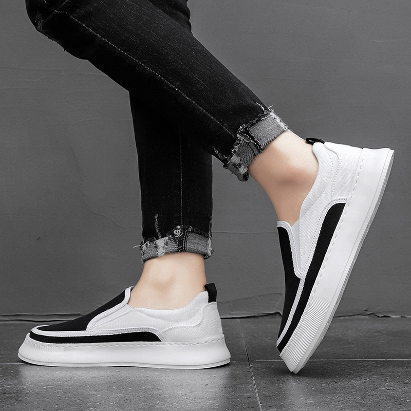 Highland Sepatu Slip On Pria Import Original Model Polos Kekinian Sepatu Jalan Pria Hitam Outdoor Sekolah Kerja Kuliah MC604
