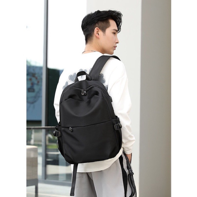 Tas Ransel Laptop sampai 15.6 inch Premium Anti Air Dengan Slot Usb untuk cas Hp Model Korea