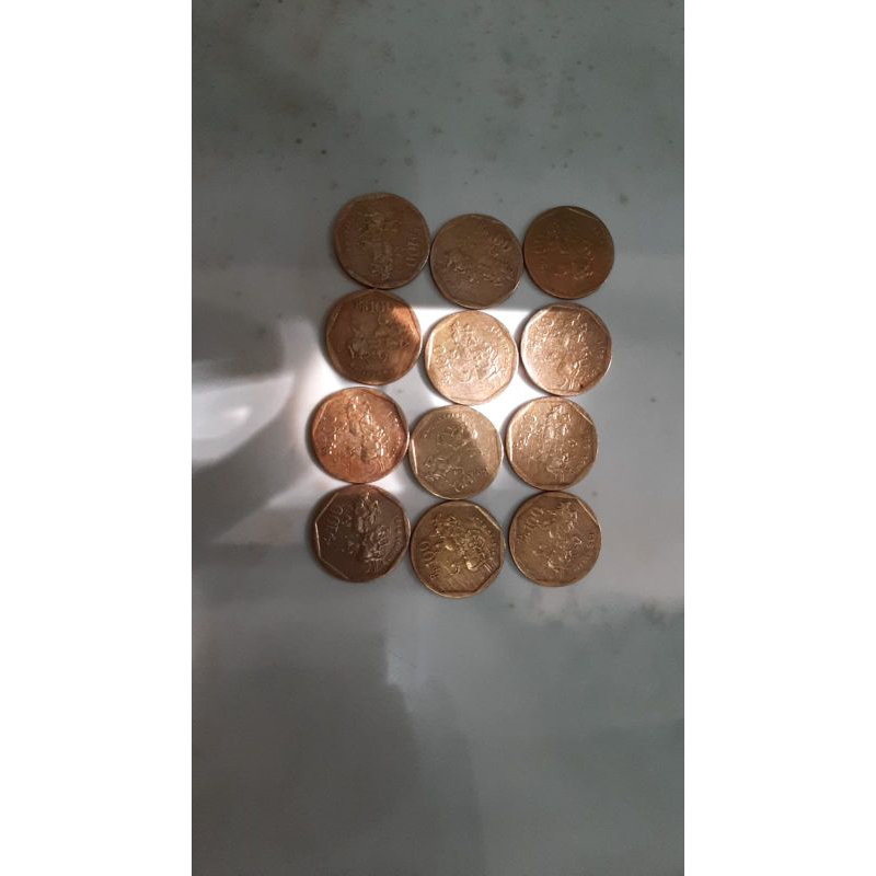 Uang koin kuno 100 Rupiah Karapan Sapi