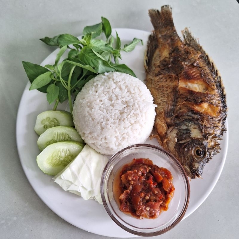 

Nasi Box Ikan Mujaer Goreng Sambal Rampai Terima pesanan