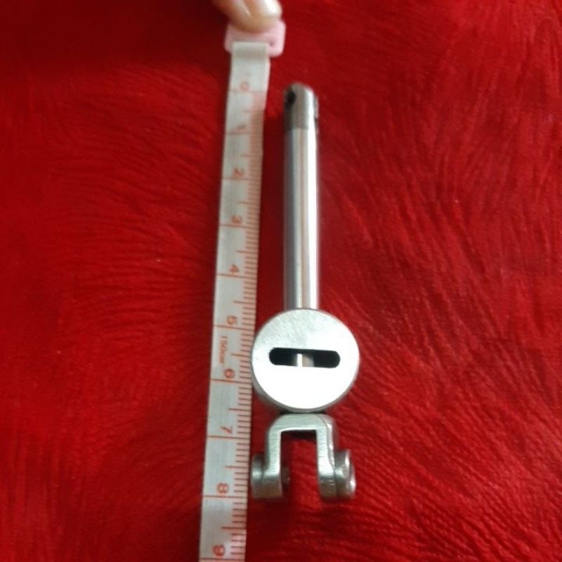 Dudukan loper atas mesin jahit obras sunstar