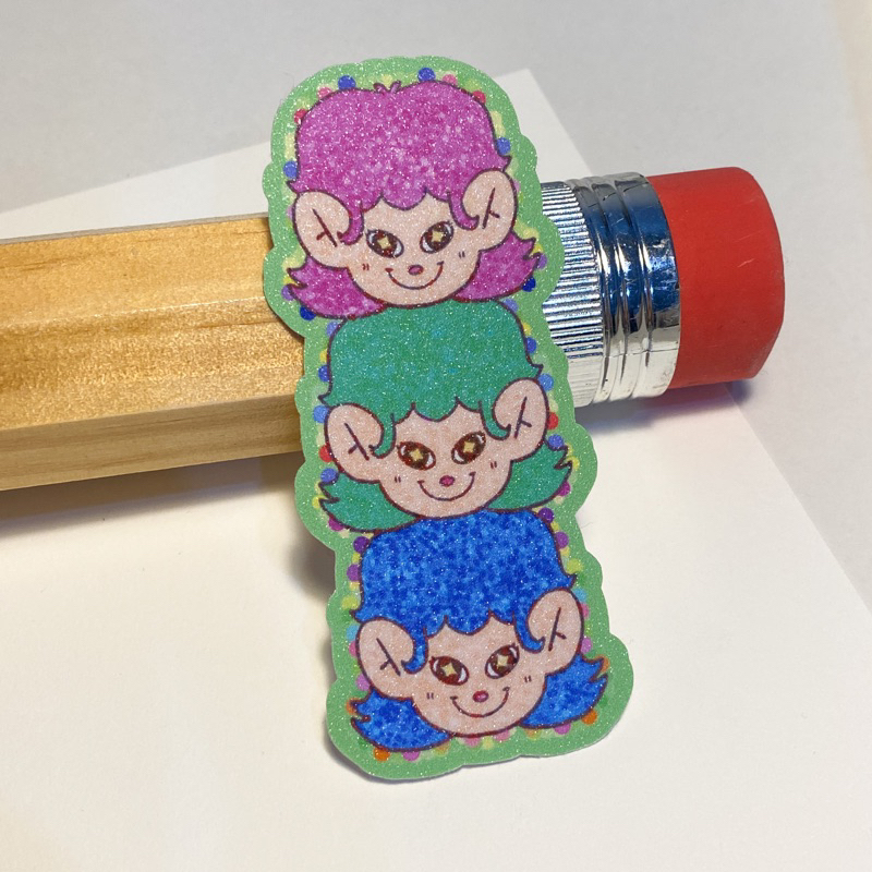 

groll.ce - triplets glitter die cut sticker