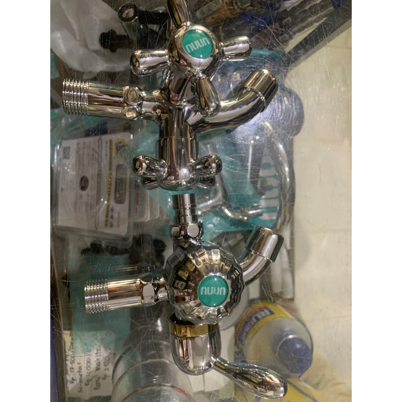 kran air shower merk unnu