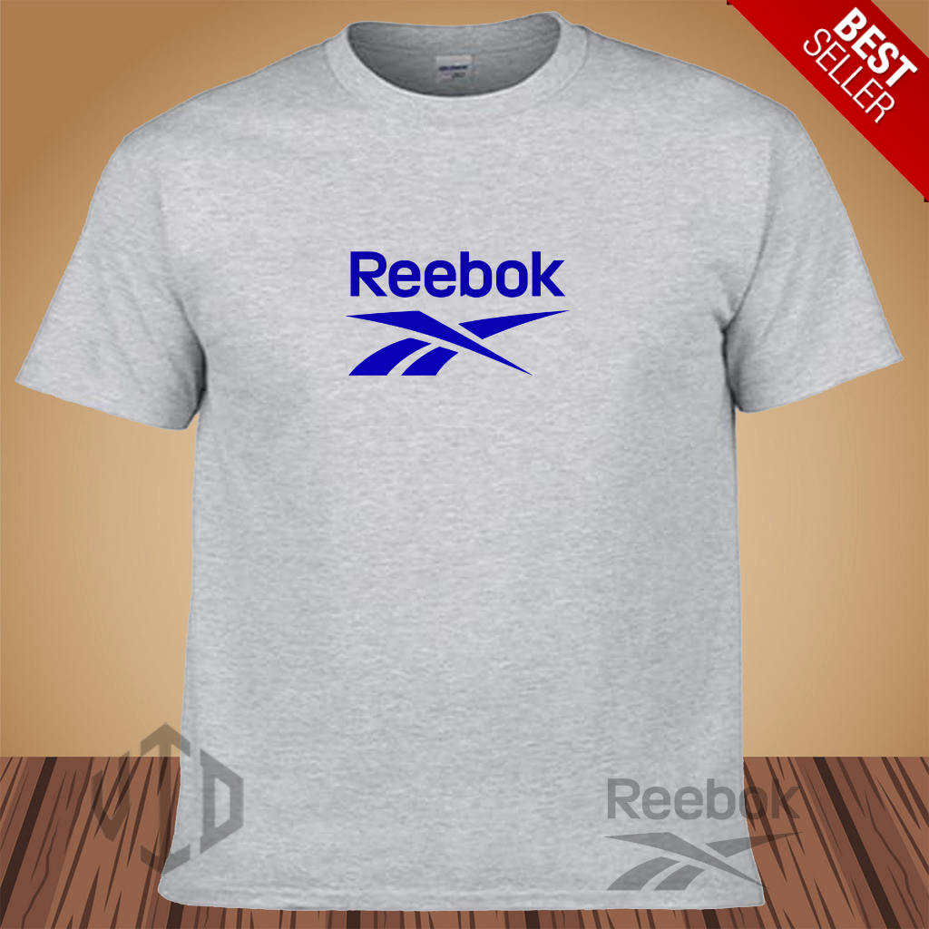 Kaos Keren Lengan Pendek LOGO RIEBOOK MOTIF BIRU Distro Premium / Kaos Murah / Kaos Ukuran Jumbo/Pri
