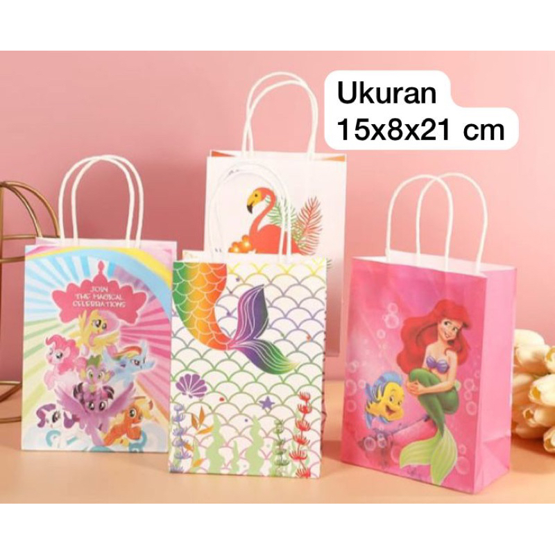 

Paper bag motif per pack isi 12 (15cm x8cm x 21cm)