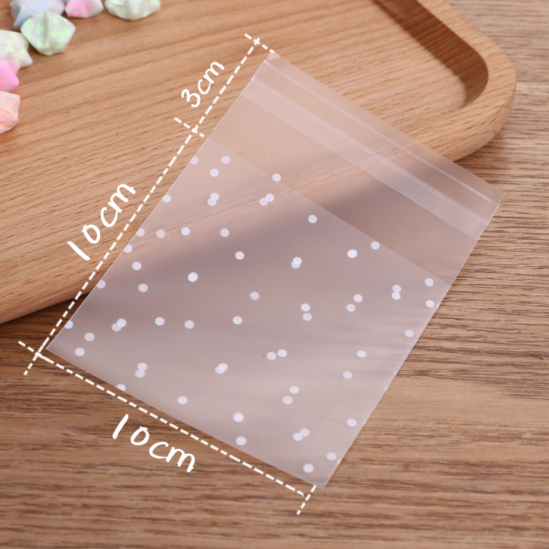 

PLASTIK COOKIES POLKADOT DOFF MATTE UKURAN 7X7 DAN 10X10 CM