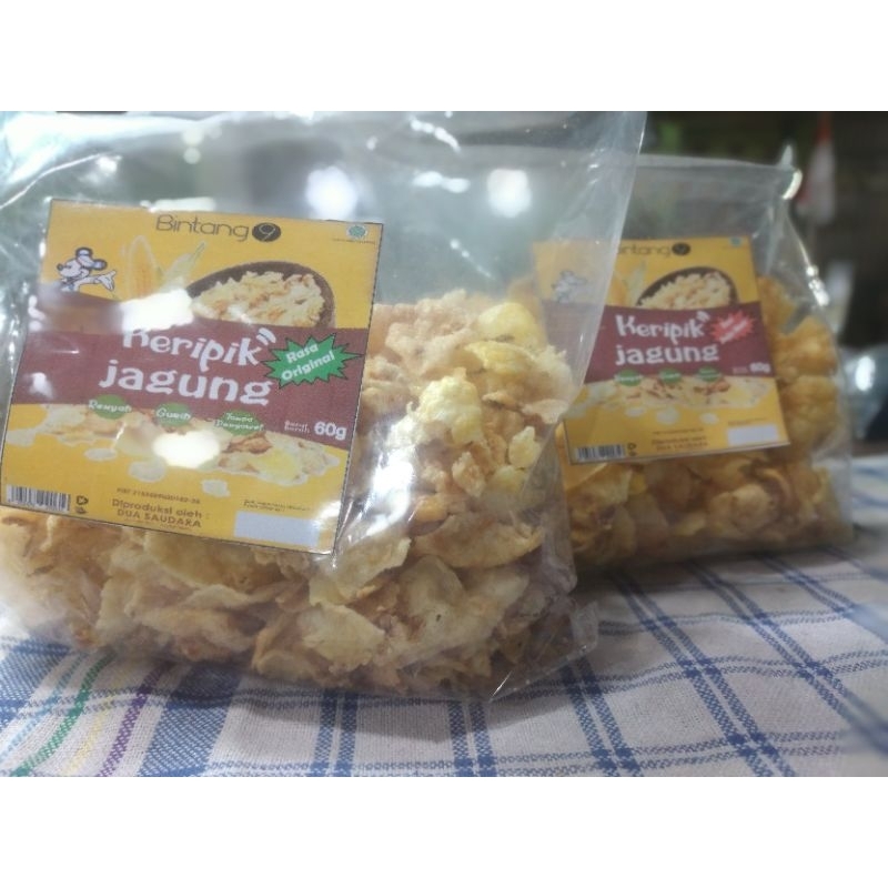 

Keripik Jagung Gepeng 60gr Bintang 9 Madura