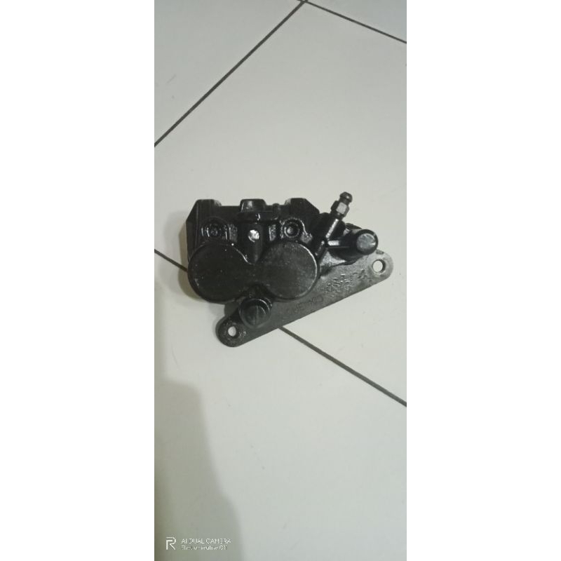 Kaliper pala babi supra x 125 depan original copotan