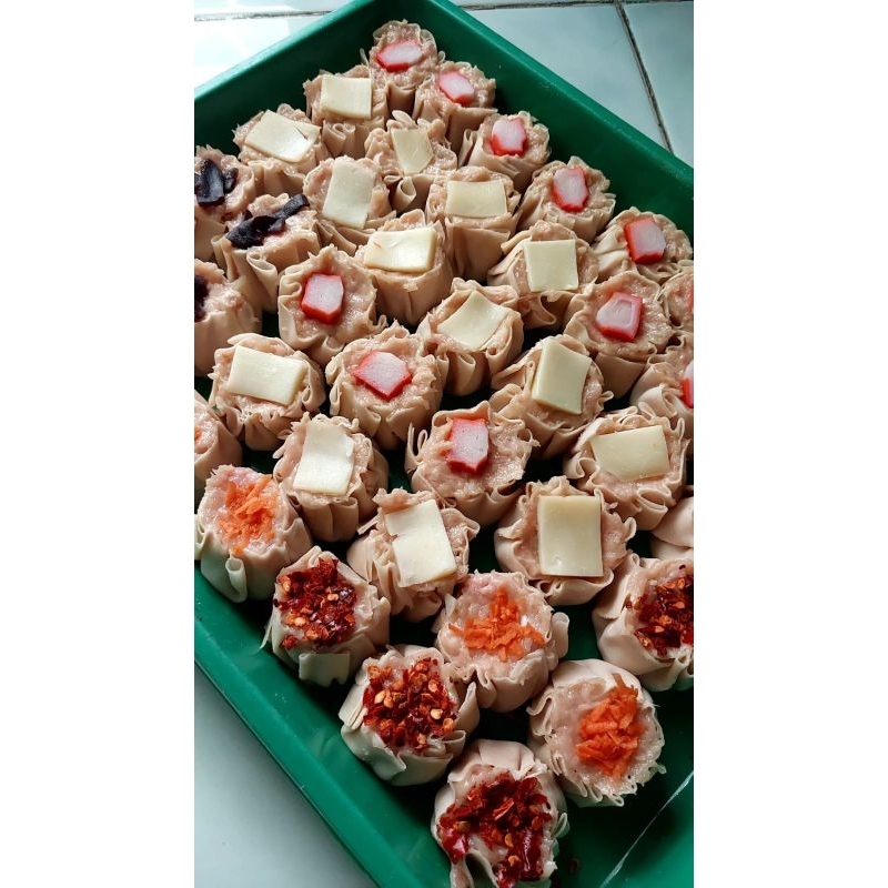 

DIMSUM AYAM ISI 10 FREE SAOS BANGKOK-PREMIUM FROZEN FRESH
