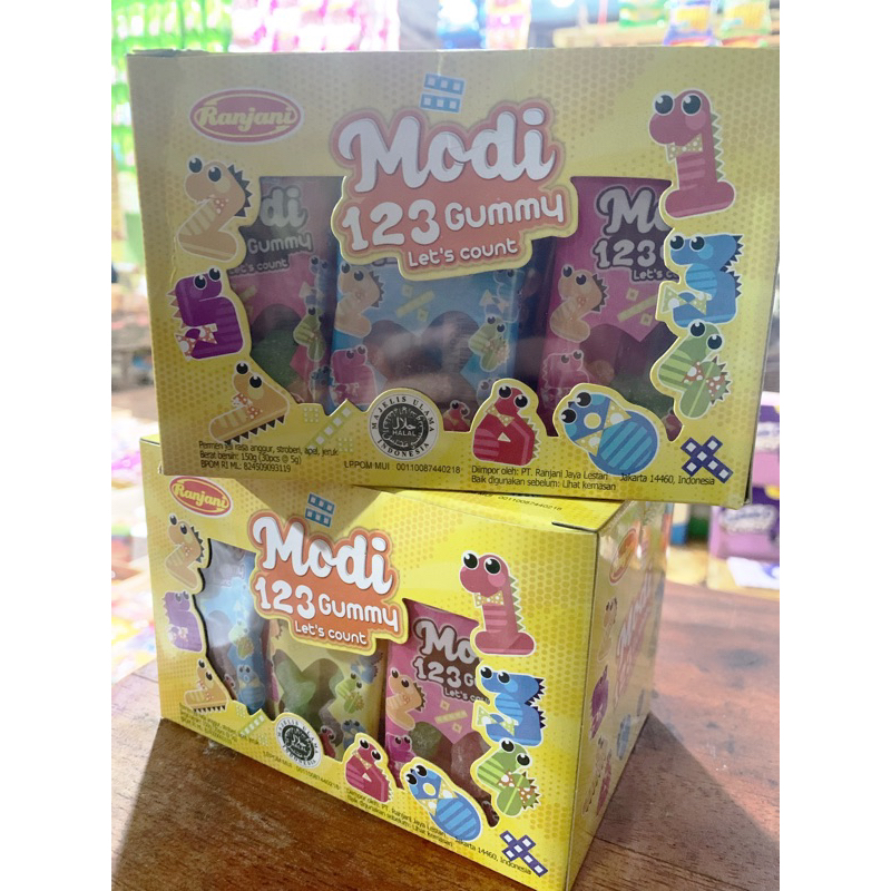 

MODI 123 GUMMY PERMEN JELI RASA ANGGUT STROBERI APEL DAN ANGGUR 1 BOX ISI 30BUNGKUS @5gr