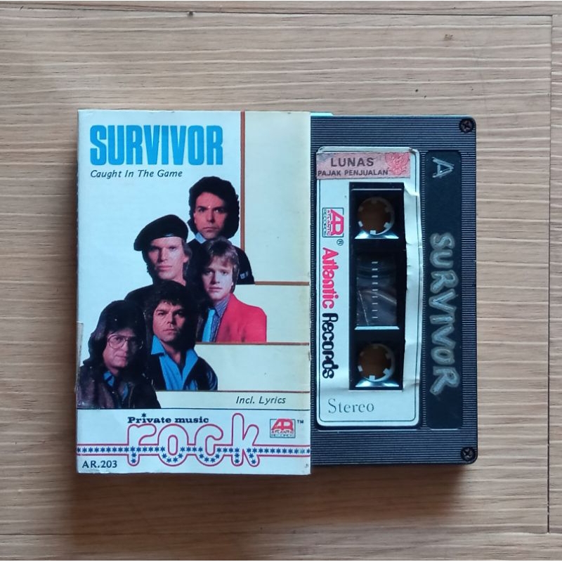 Kaset Survivor Caught In The Game Bekas | Lapak Lawas