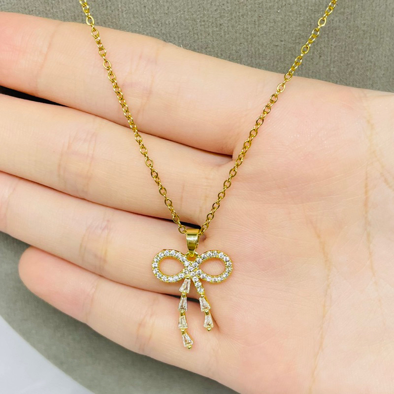 Kalung Titanium Pita juntai permata wanita