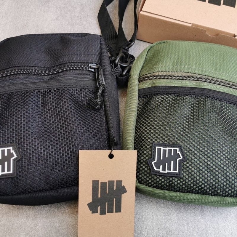 Sling Bag Pria Undefeated Kanvas Black Green With Box