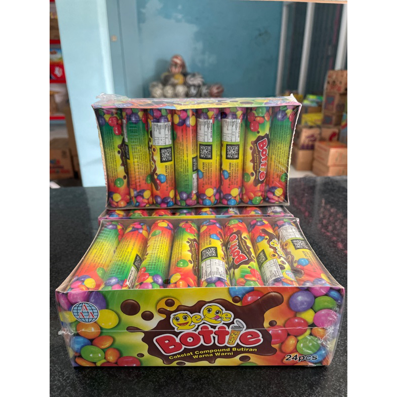 

Bottie Cokelat Coumpound Butiran Warna Warni Isi 24pcs