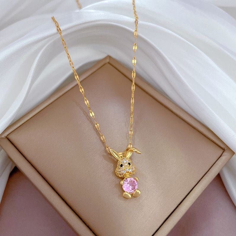 kalung titanium fashion kelinci mata pink dan putih