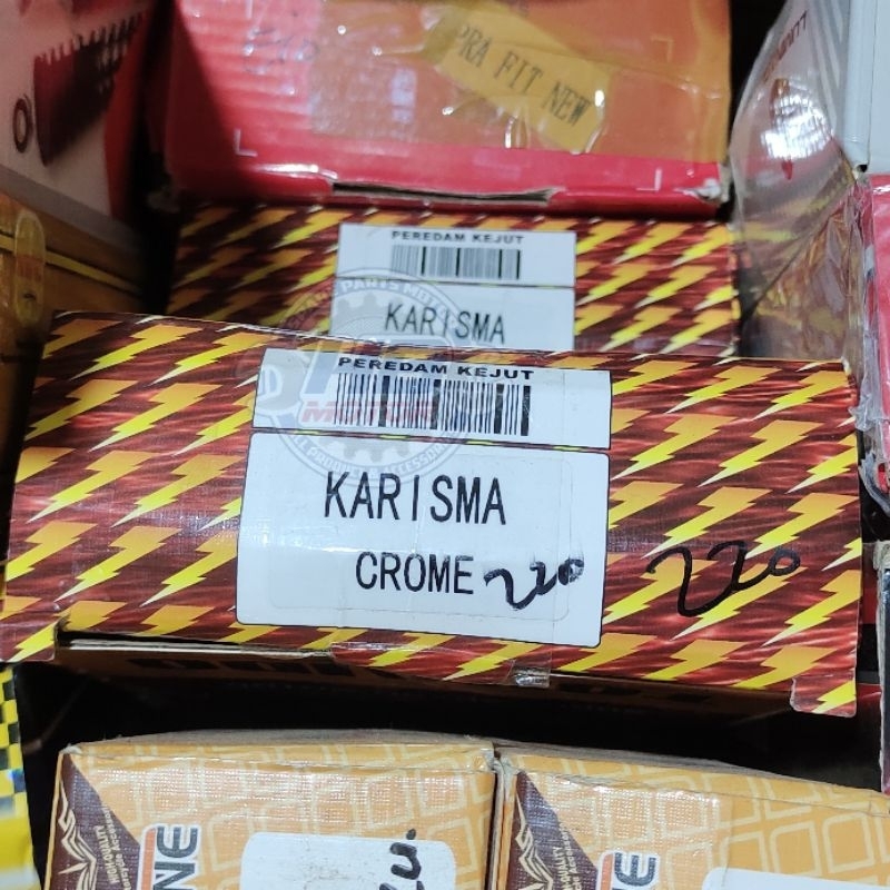 Shock Belakang Karisma