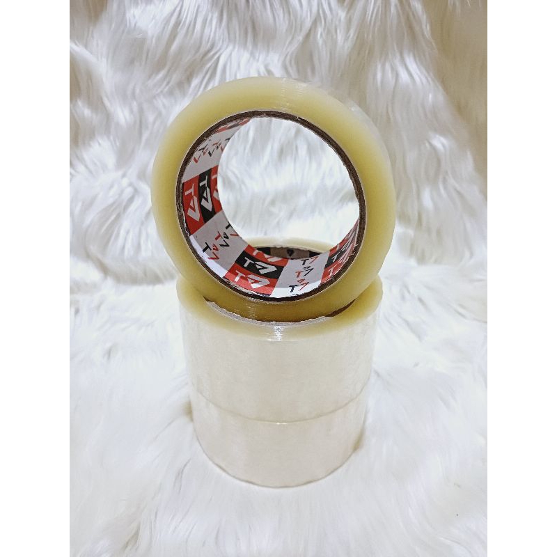 

Lakban Bening T7 tape 45mm x100 yard EKONOMIS (1 DUS) ISI 72 ROLL