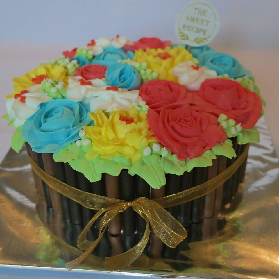 

Cake Flower Blue, Red And Yellow