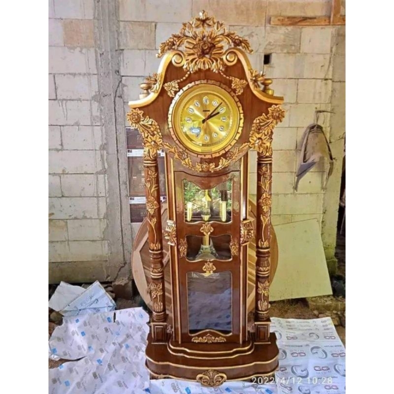 lemari jam ukir jepara