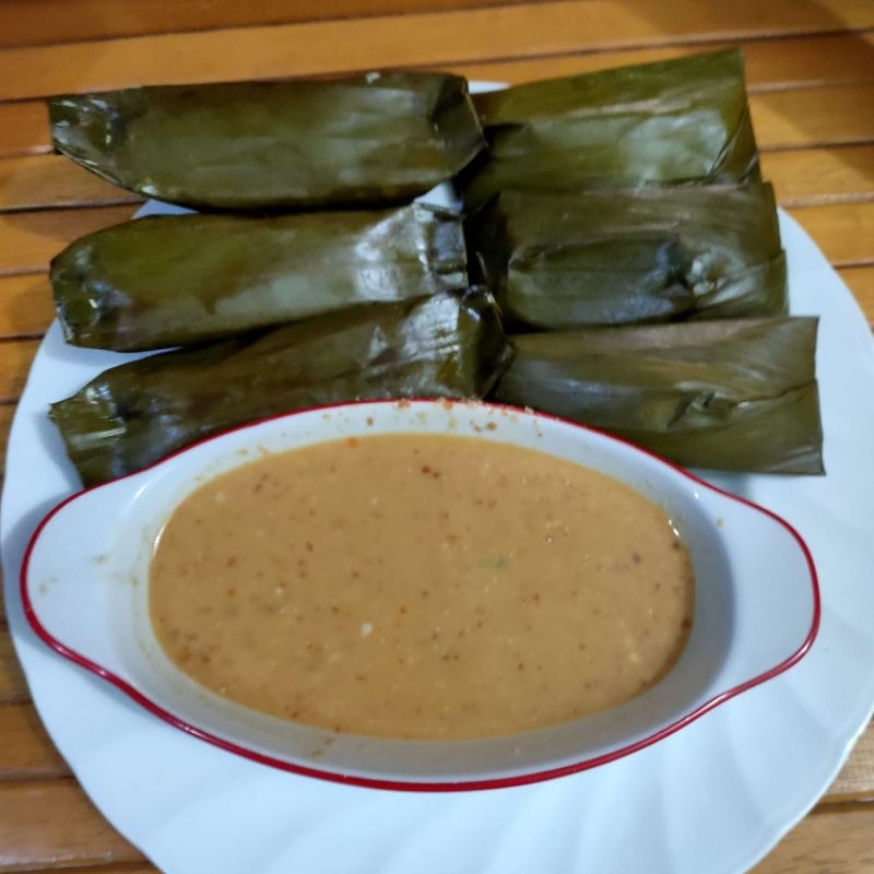 

lontong isi oncom / ayam sayur (10pc)