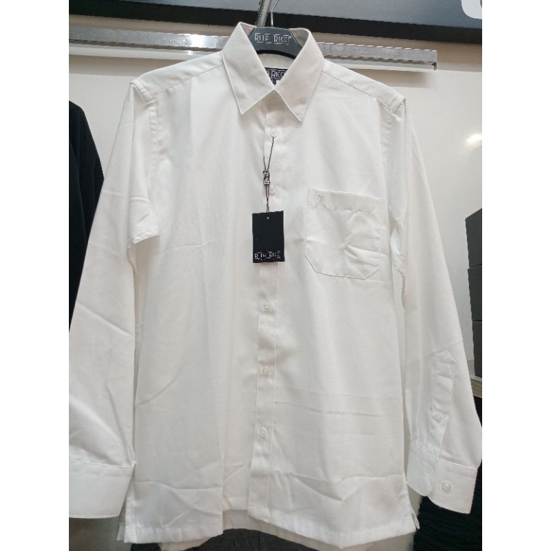 kemeja PDH putih koleksi Rita Ricci