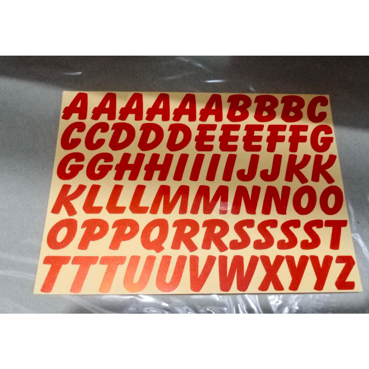 

STIKER KECIL CUTTING HURUF ABJAD BERBAGAI WARNA FONT DELFINO ITALIC