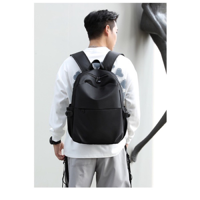 Tas Ransel Laptop sampai 15.6 inch Premium Anti Air Dengan Slot Usb untuk cas Hp Model Korea