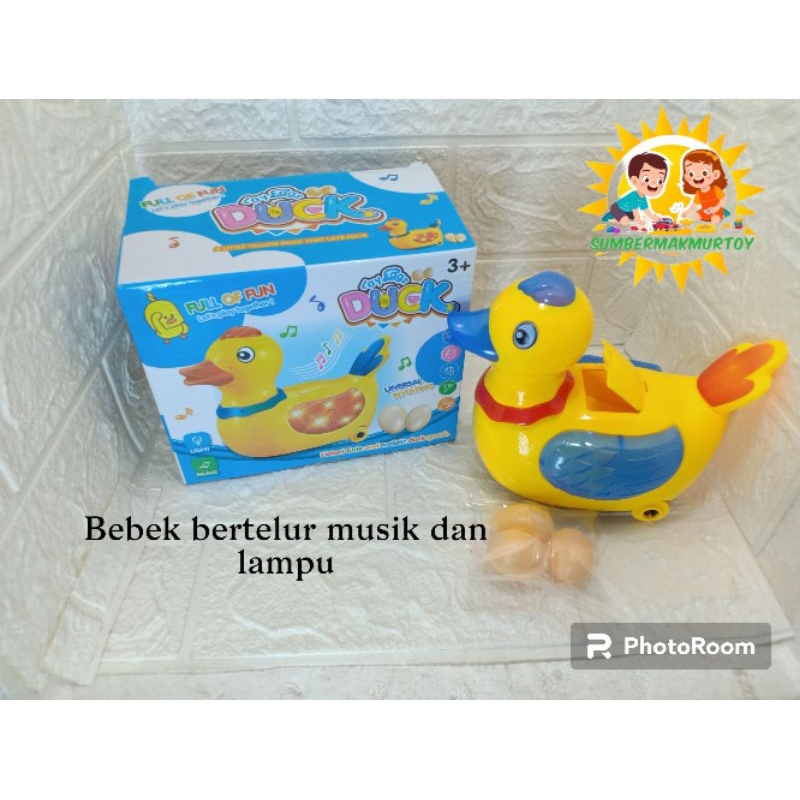 Mainan Anak Bebek Bertelur musik dan lampu