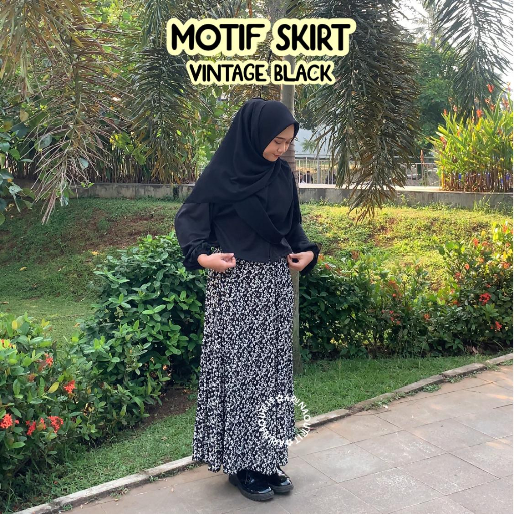 MOTIF PLEATED SKIRT