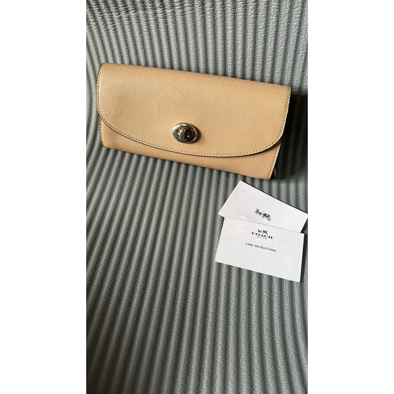 prelove dompet coach