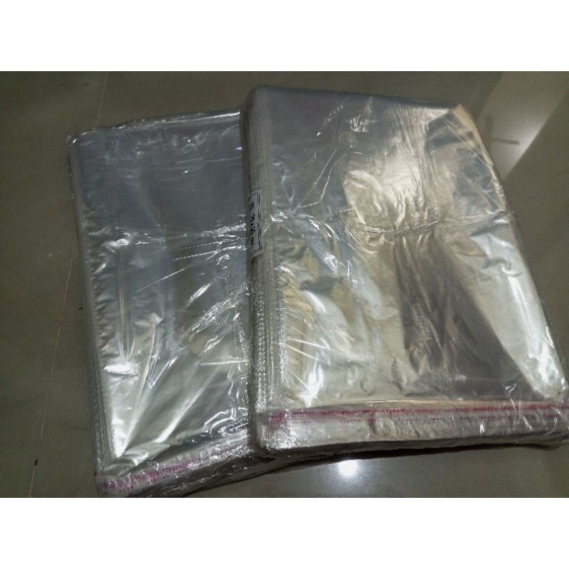 Plastik Opp baju tebal 0.5 ukuran 20x30 / plastik opp packing 20 x 30 seal lem isi 100 lembar