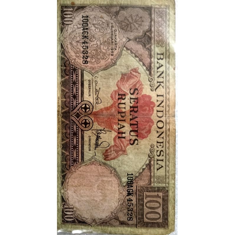 Numistik / uang kertas 100 rupiah kuno gambar burung rangkong