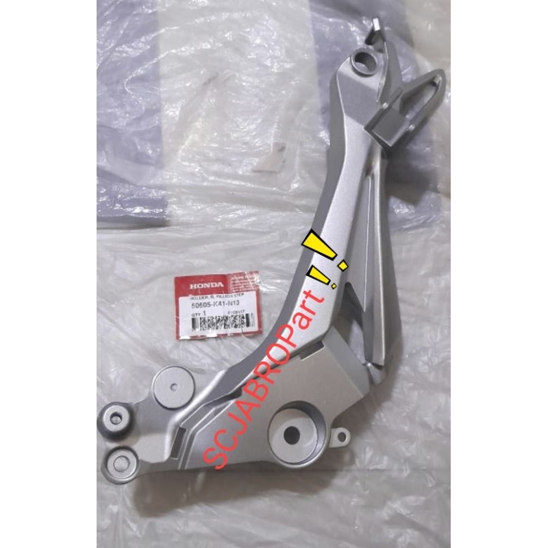 HOLDER R PILLION STEP HONDA SUPRA X 125 DD..50605 K41 N10..ORI AHM