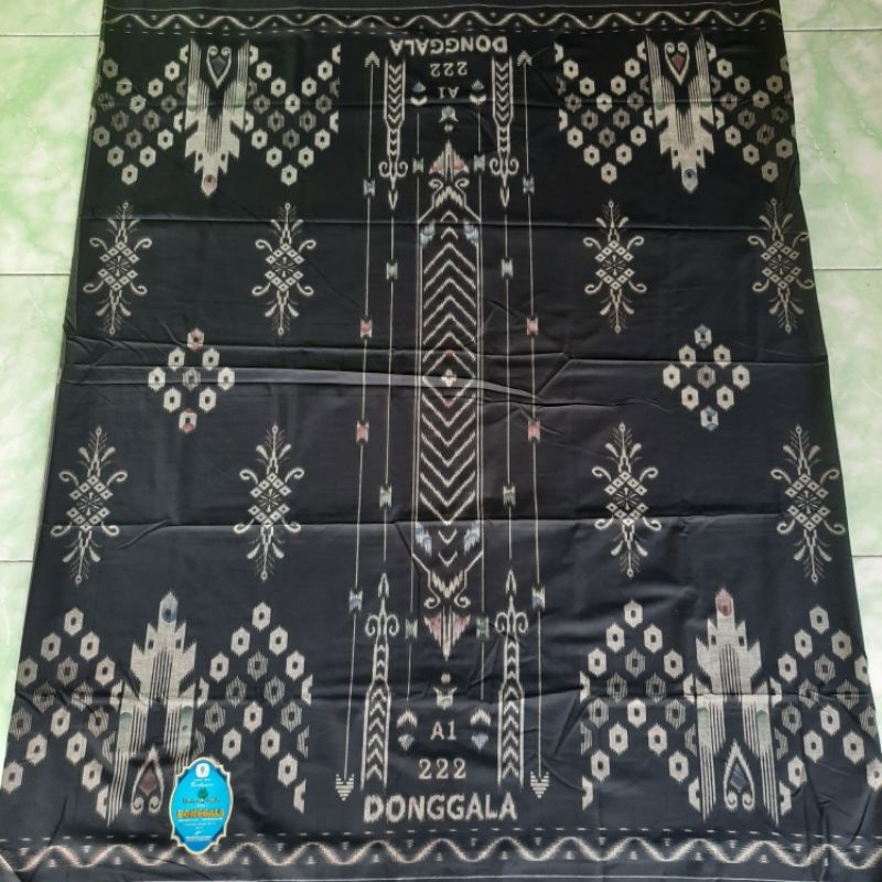 Sarung Donggala Hitam Manggis 3d. Sarung Dewasa. Sarung Donggala Seragaman.