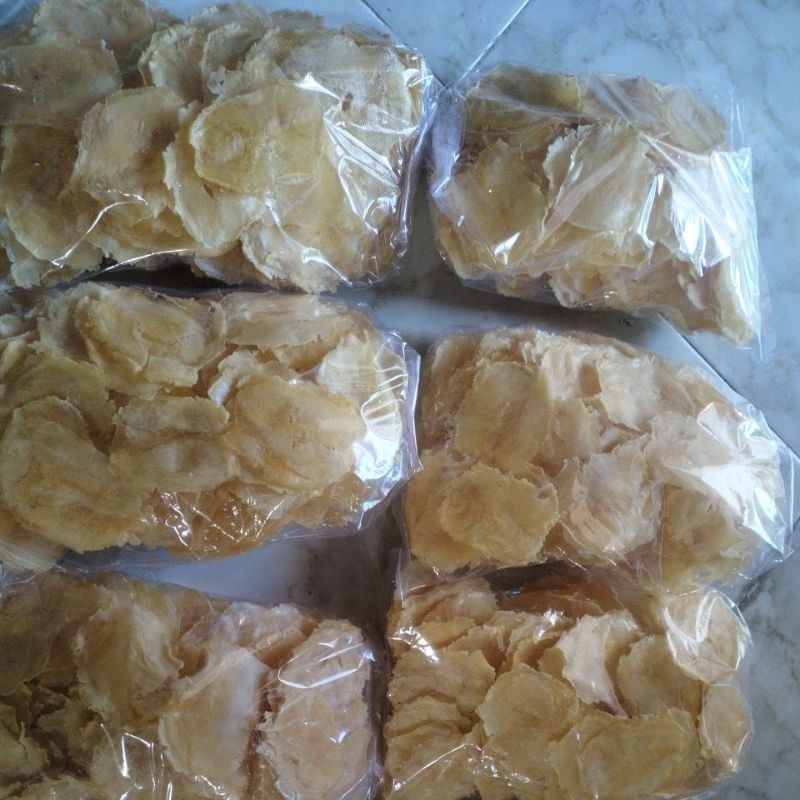 

keripik tette, keripik yg terbuat dari singkong rasa bawang putih armos Gurih