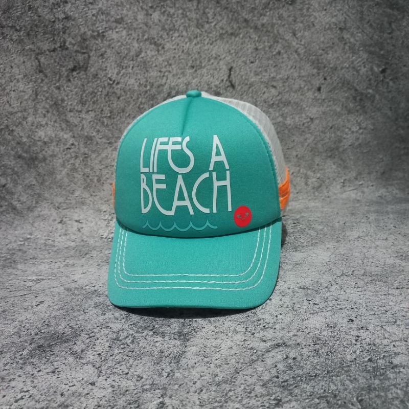 TOPI MOTIF PANTAI ROXY LIVE IS BEACH