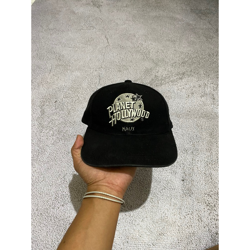 Topi Planet Hollywood