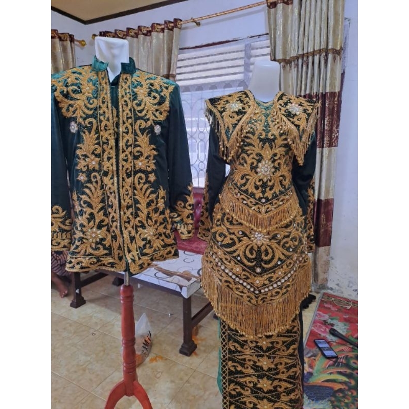 baju penganten minang spasang.