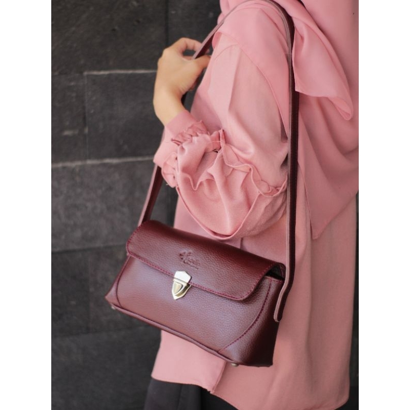 TAS PESTA  ASLI KULIT